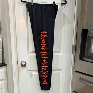 Black Leggings with Red Orange Script